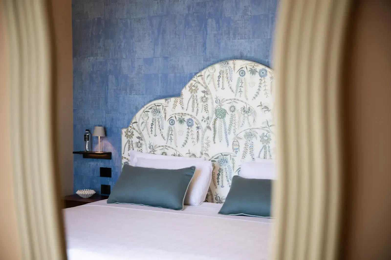 The bed, seen from the doorway