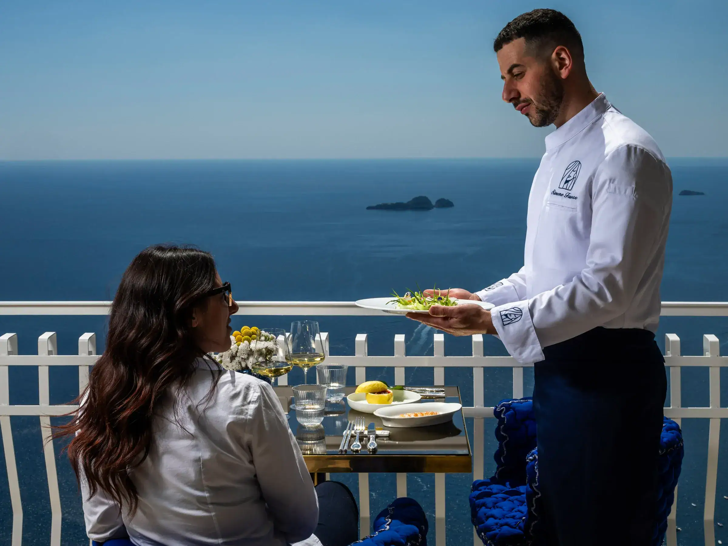 Lunch served on the terrace, with Li Galli and the sea behind