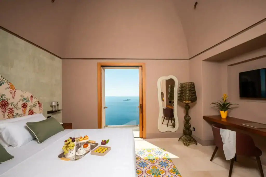 Luxury hotel room with sea view and modern decor in Petra.